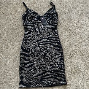 Sequin body on dress. New with tags never been worn.
